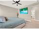 Bedroom with neutral walls and ceiling fan at 765 Terrapin Dr, Debary, FL 32713