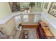 Cozy living room with a vaulted ceiling, decorative tapestry, and ample natural light at 821 N Lake Claire Cir, Oviedo, FL 32765