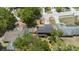 This home has mature trees and landscaping as well as a spacious driveway at 825 Mellowood Ave, Orlando, FL 32825