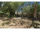 Backyard area featuring a swing bench at 825 Mellowood Ave, Orlando, FL 32825
