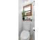 Bright powder room features toilet, decor, and modern fixtures at 825 Mellowood Ave, Orlando, FL 32825