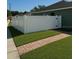 Backyard featuring a clean white fence at 8325 Sun Vista Way, Orlando, FL 32822