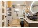 Luxurious bathroom boasts a soaking tub, a modern vanity, and stylish fixtures, perfect for relaxation and comfort at 8325 Sun Vista Way, Orlando, FL 32822