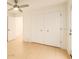 This bedroom offers plenty of storage with a closet and an attached door at 8325 Sun Vista Way, Orlando, FL 32822