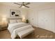 Charming bedroom with a large window, built-in shelving, and a cozy vibe at 8325 Sun Vista Way, Orlando, FL 32822
