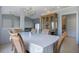 Dining room with natural light, tile floor and a view to the living room and the entry way at 8509 Sw 136Th Loop, Ocala, FL 34473