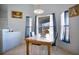 Breakfast nook with a tile-top table and chairs, and lots of natural light at 8509 Sw 136Th Loop, Ocala, FL 34473