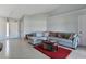 Open living room with tile flooring and neutral walls, perfect for entertaining guests at 8509 Sw 136Th Loop, Ocala, FL 34473
