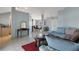 Bright and airy living room with tile flooring leading into the dining area at 8509 Sw 136Th Loop, Ocala, FL 34473