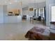 Open-concept living area showcasing seamless transition between living, dining, and kitchen spaces at 8509 Sw 136Th Loop, Ocala, FL 34473