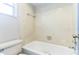 Modest bathroom featuring a toilet, bathtub and minimal fixtures at 3673 Westland Ct, Orlando, FL 32818
