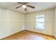 Bedroom featuring a window for natural light and overhead fan at 3673 Westland Ct, Orlando, FL 32818