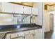 Open concept kitchen featuring modern countertops, ample storage space, and seamless flow to living spaces at 3673 Westland Ct, Orlando, FL 32818
