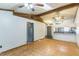 Living room with tile flooring and overhead fans with entrances to other rooms at 3673 Westland Ct, Orlando, FL 32818