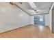 Living room with ceiling fan, skylight, and patio access at 3673 Westland Ct, Orlando, FL 32818