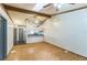 Spacious living room with ceiling fans, and open access to a kitchen area at 3673 Westland Ct, Orlando, FL 32818