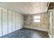 Enclosed sunroom with concrete block wall and window at 3673 Westland Ct, Orlando, FL 32818