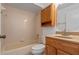 Bathroom featuring a tub, and wooden vanity at 10030 Cheshunt Dr, Orlando, FL 32817