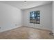 Bedroom with tile flooring and natural light from the window at 10030 Cheshunt Dr, Orlando, FL 32817