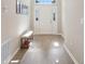 Bright foyer with light hardwood floors and natural light at 1052 Cascade Dr, Davenport, FL 33837