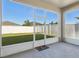 Screened patio with view of the spacious yard at 1052 Cascade Dr, Davenport, FL 33837