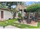 Relaxing outdoor space with fireplace, lounge seating and tv at 1110 Greenwood St, Orlando, FL 32801