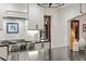 Contemporary kitchen with stainless steel range, dark countertop, and white cabinets at 1110 Greenwood St, Orlando, FL 32801