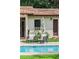 Relaxing poolside seating featuring a charming outdoor area perfect for enjoying the serene views and atmosphere at 1110 Greenwood St, Orlando, FL 32801