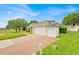 Charming one-story home with well-manicured landscaping, a two-car garage, and inviting curb appeal at 114 Dolcetto Dr, Davenport, FL 33897