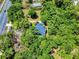 Private home surrounded by lush trees and natural landscaping at 1155 Taylor E Rd, Deland, FL 32724