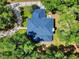 Aerial view of roof, landscaping and patio at 1155 Taylor E Rd, Deland, FL 32724