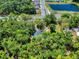 Secluded home nestled among mature trees, near a pond and a quiet neighborhood at 1155 Taylor E Rd, Deland, FL 32724