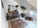 Attic nook showing decor and furnishings on a neutral rug, creating a cozy and stylish retreat at 1155 Taylor E Rd, Deland, FL 32724