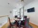 Casual dining room with wood table and modern decor, with access to the bedroom at 1155 Taylor E Rd, Deland, FL 32724
