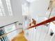 Foyer with staircase, crystal chandelier, and high windows illuminating the entrance at 1155 Taylor E Rd, Deland, FL 32724