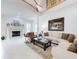 Bright and spacious living room with fireplace, tile floors, comfortable seating, and tasteful decor at 1155 Taylor E Rd, Deland, FL 32724
