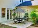 Covered patio with seating and a view of the yard at 1155 Taylor E Rd, Deland, FL 32724