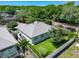 Lovely backyard features well-manicured lawn, privacy fence, and mature landscaping at 1157 Valley Creek Run, Winter Park, FL 32792