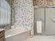 Bathroom featuring a bathtub and shower at 1157 Valley Creek Run, Winter Park, FL 32792