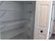 Walk in closet with white walls and wire shelving for ample storage space at 1157 Valley Creek Run, Winter Park, FL 32792