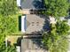 Aerial view of home, showcasing roof, driveway, and well-maintained landscaping at 1174 Snug Harbor Dr, Casselberry, FL 32707