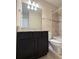 Bathroom features a shower/tub combo, granite countertop, and tiled floors at 11962 Autumn Fern Ln, Orlando, FL 32827
