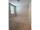 Cozy bedroom with carpeted floors and a window for natural light at 11962 Autumn Fern Ln, Orlando, FL 32827