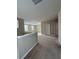 Upstairs bonus room with carpet and neutral paint at 11962 Autumn Fern Ln, Orlando, FL 32827