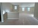 An empty bonus room featuring neutral paint and plush carpeting at 11962 Autumn Fern Ln, Orlando, FL 32827