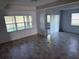 Spacious living room with tile flooring and natural light, offering a versatile and comfortable living space at 11962 Autumn Fern Ln, Orlando, FL 32827