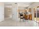 Kitchen features a dining table with slider access to the backyard at 126 Knights Hollow Dr, Apopka, FL 32712