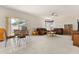 Spacious living room with dining area, comfortable seating, and natural light from windows at 126 Knights Hollow Dr, Apopka, FL 32712