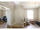 Welcoming entryway with neutral tones, modern flooring, and a view of an adjacent office at 13157 Sw 35Th Cir, Ocala, FL 34473