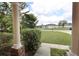 Inviting front porch with decorative columns and a view of the neighborhood at 13157 Sw 35Th Cir, Ocala, FL 34473